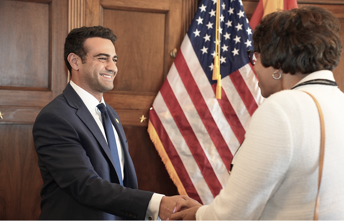 Rep. Hamadeh smiling and shaking hands